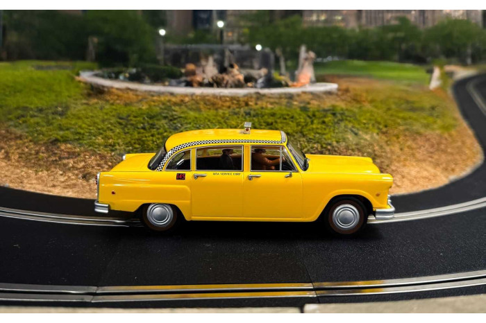 Autíčko Film & TV SCALEXTRIC C4606 - James Bond Checker Taxi Cab - Live And Let Die (1:32)